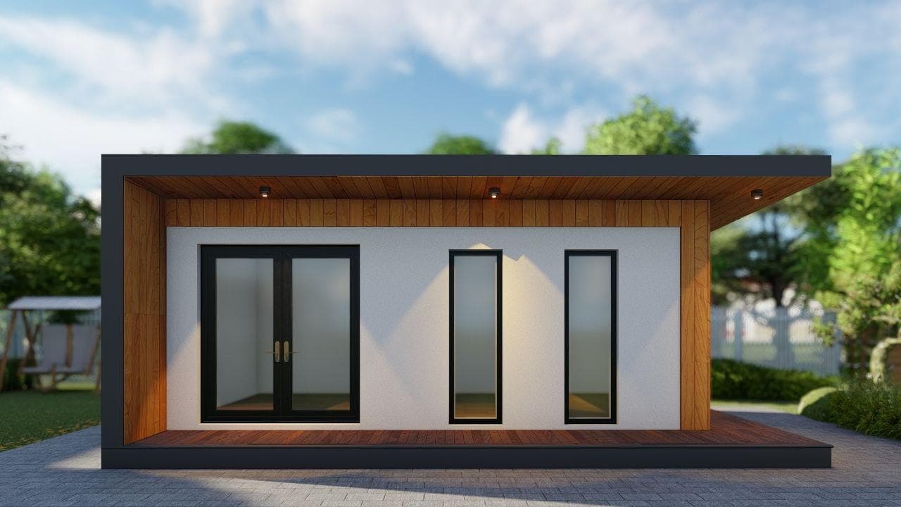 Contemporary backyard office shed with cedar-clad reveal and glass doors on a paver patio