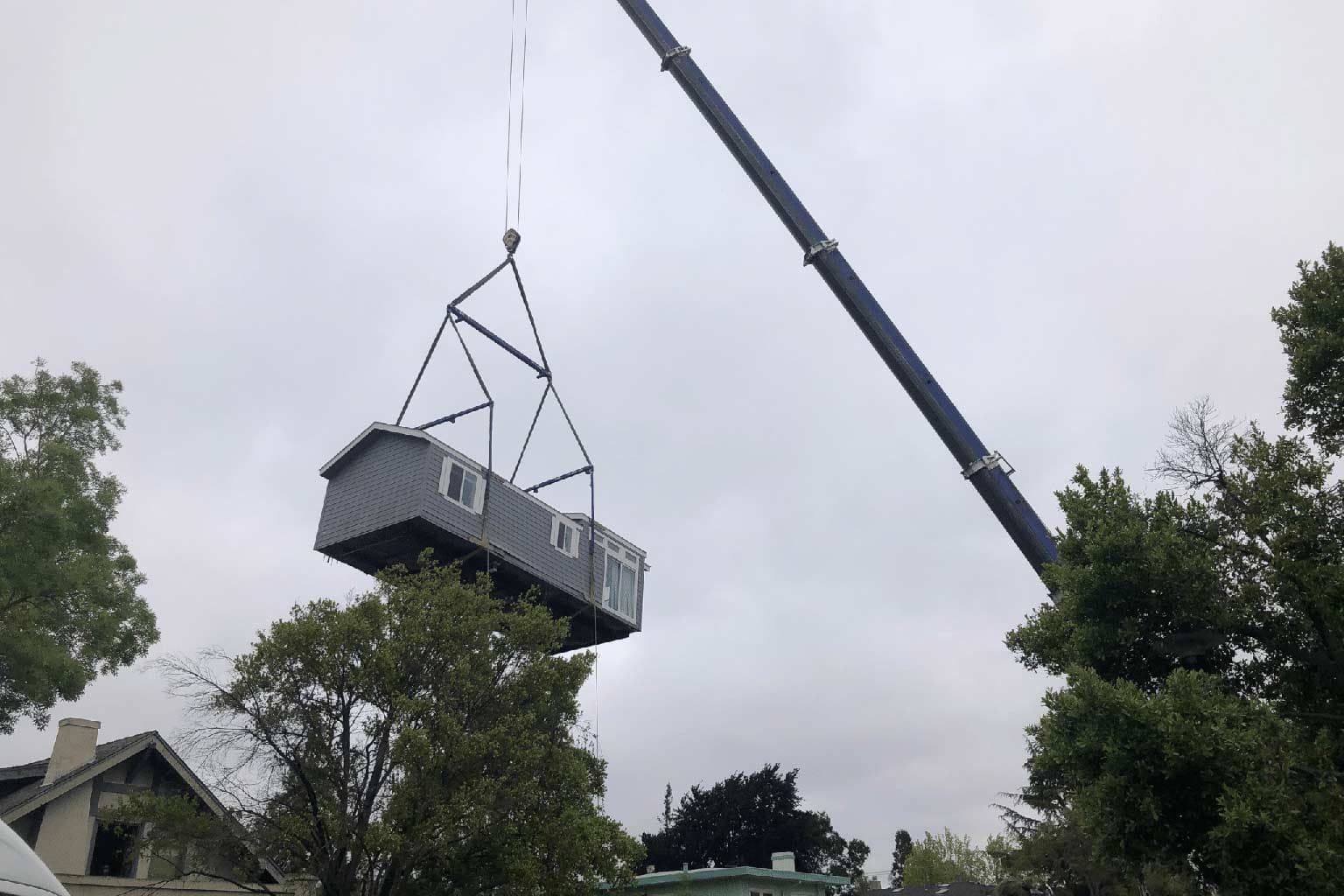 Manufactured home on a crane