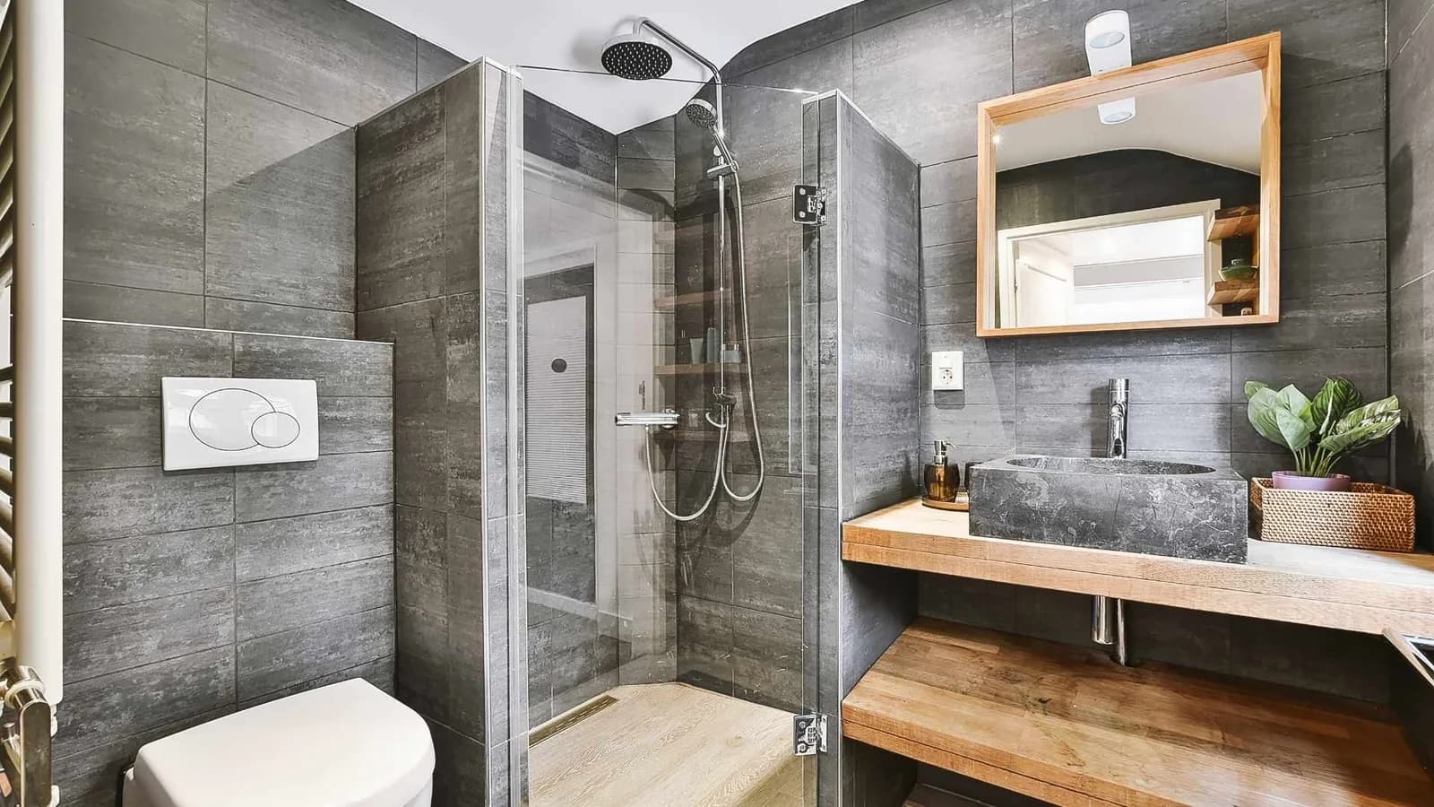 Tiny home bathroom with a corner shower