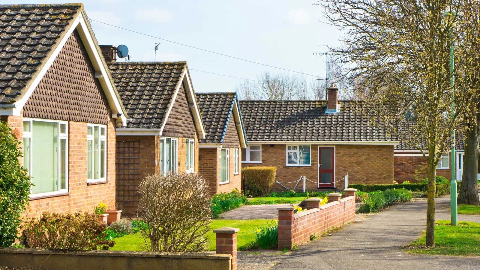 Brick-faced cottage homes lined up