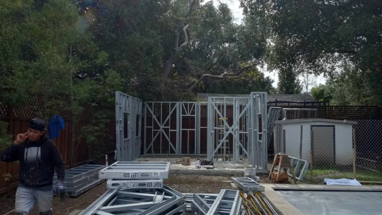 Building walls with steel panels
