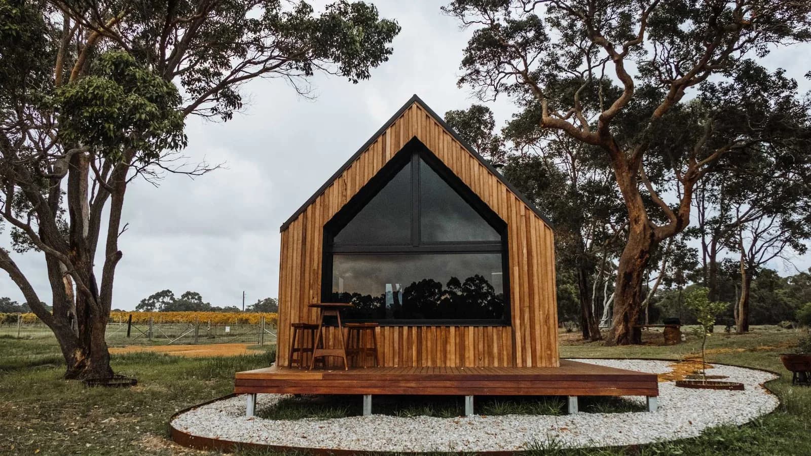 Small wooden cabin in a cottage court setting