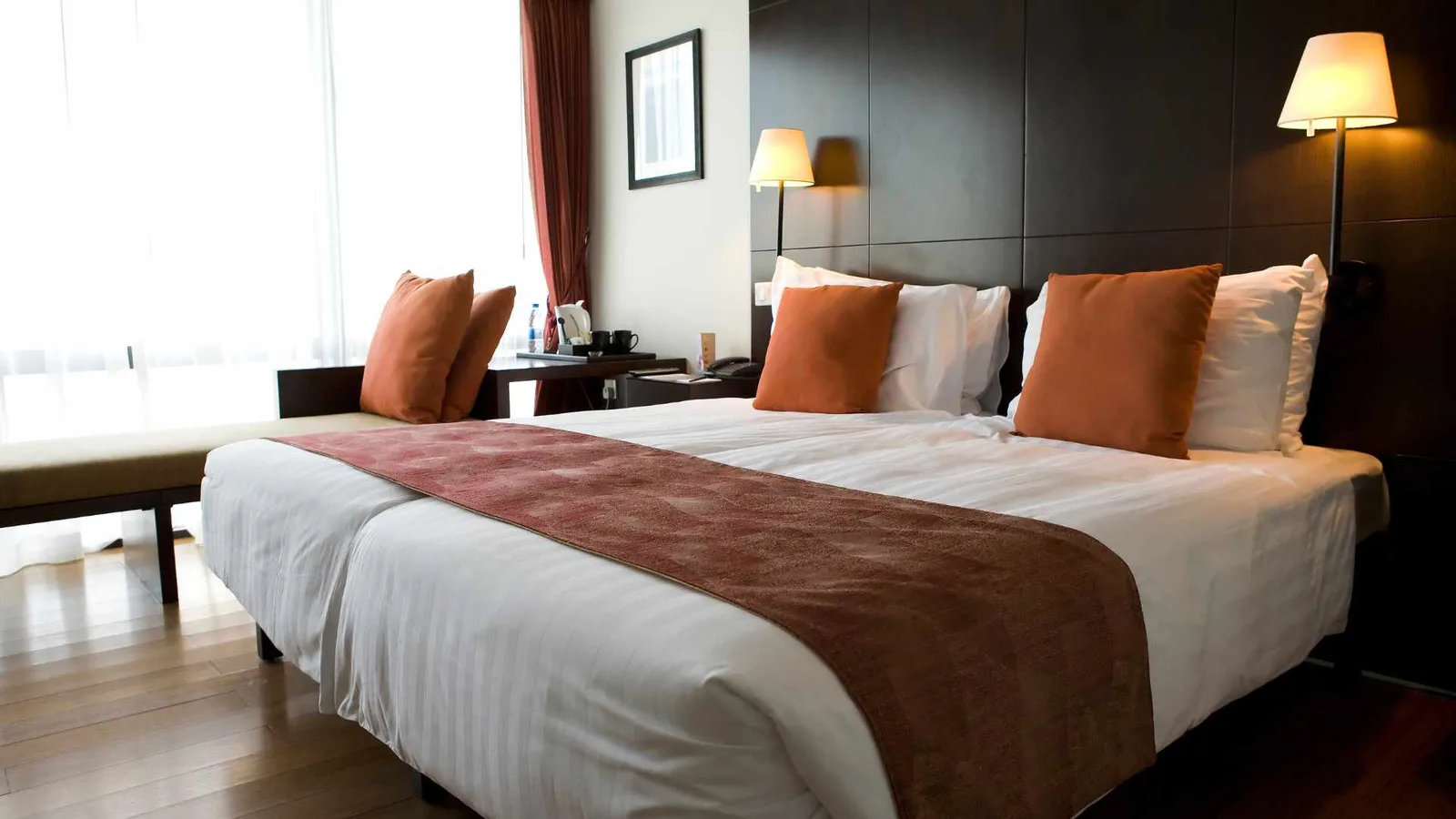 classic hotel room with wall decor