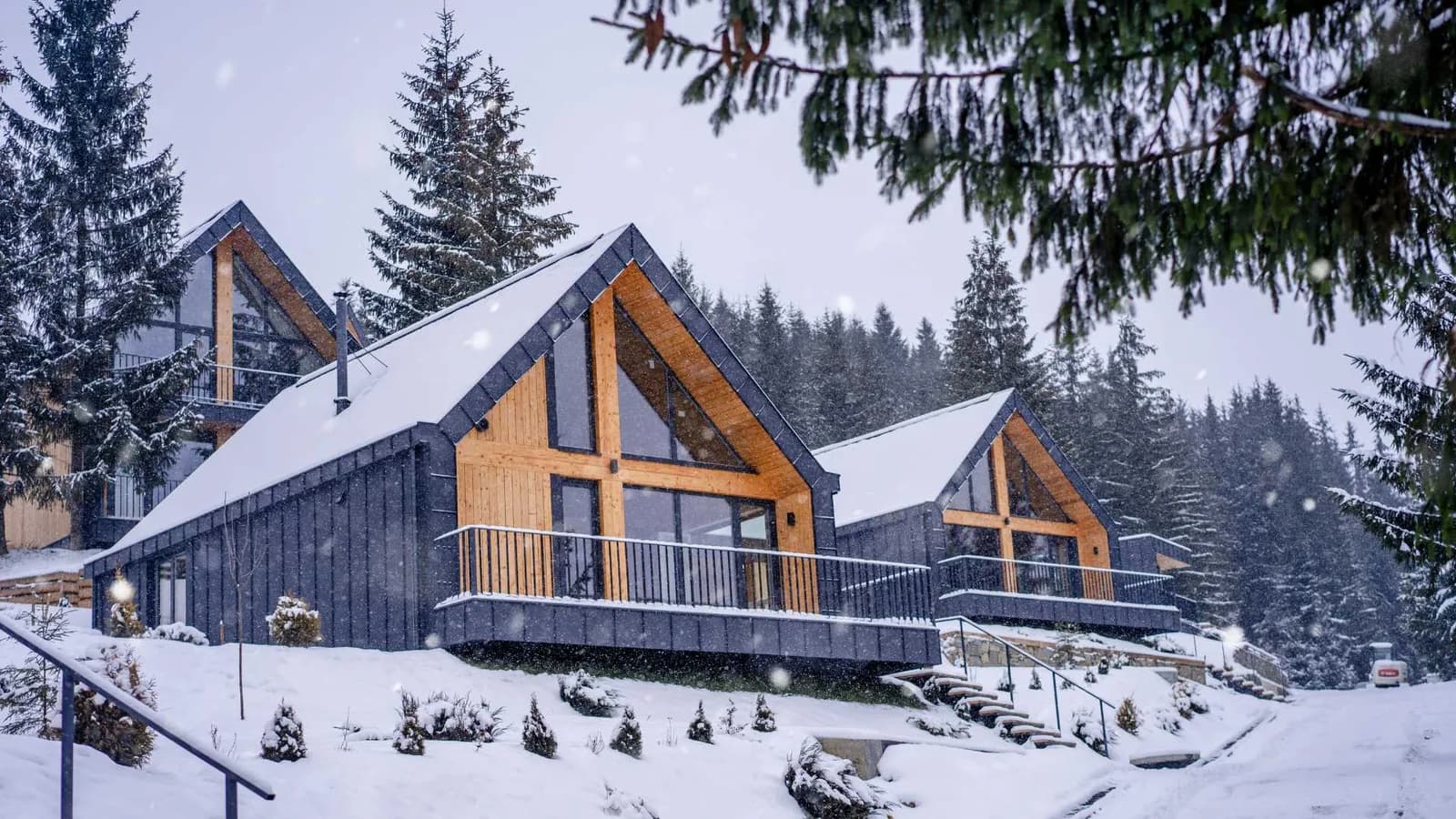 Cottages in a winter setting under snow
