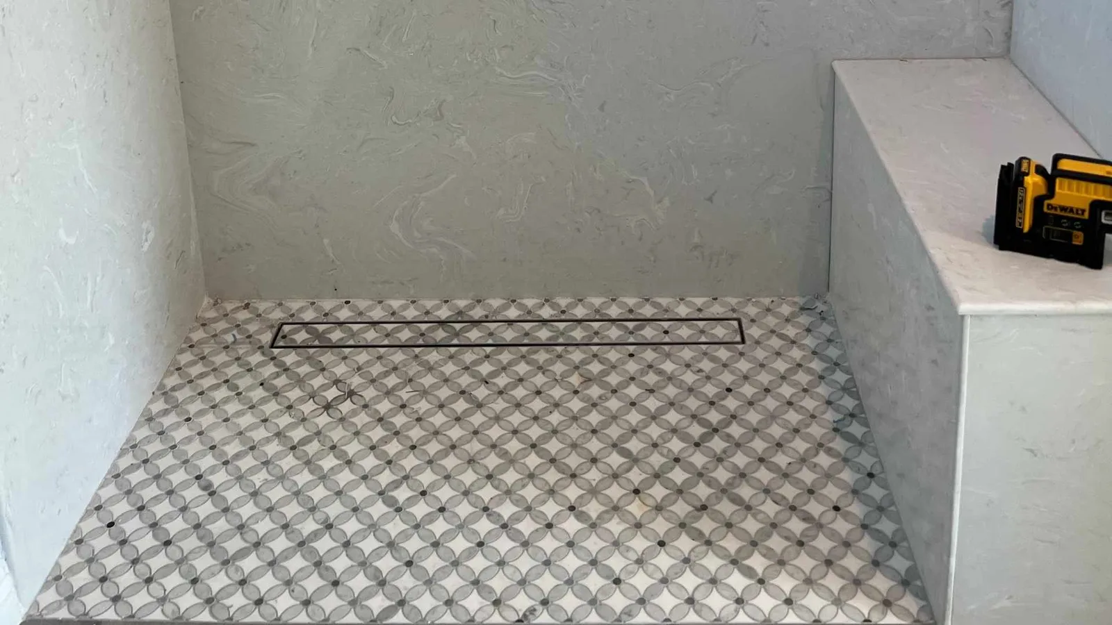 curb free shower and bench
