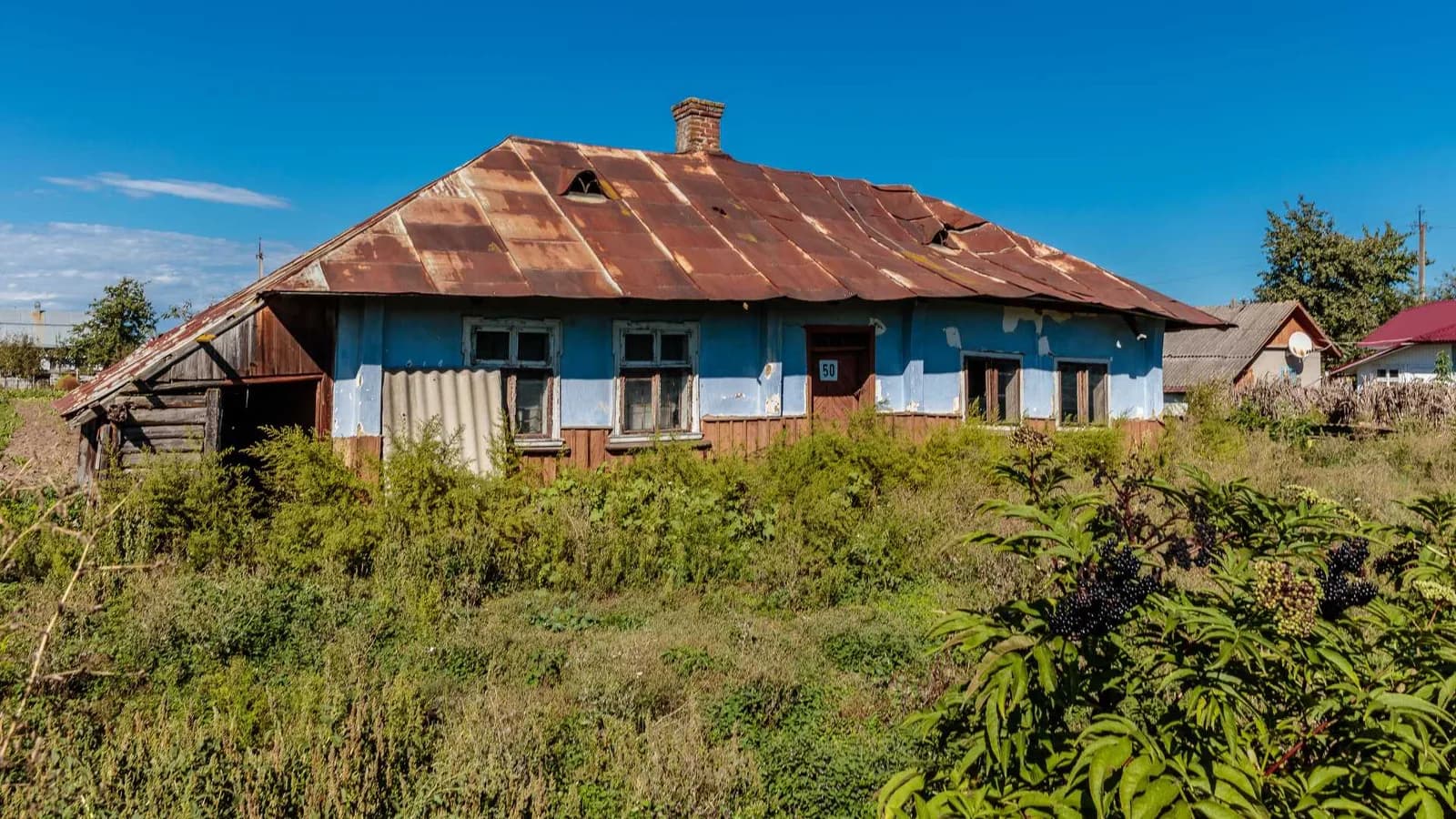 House undergoing repairs with a permit to abate a code violation