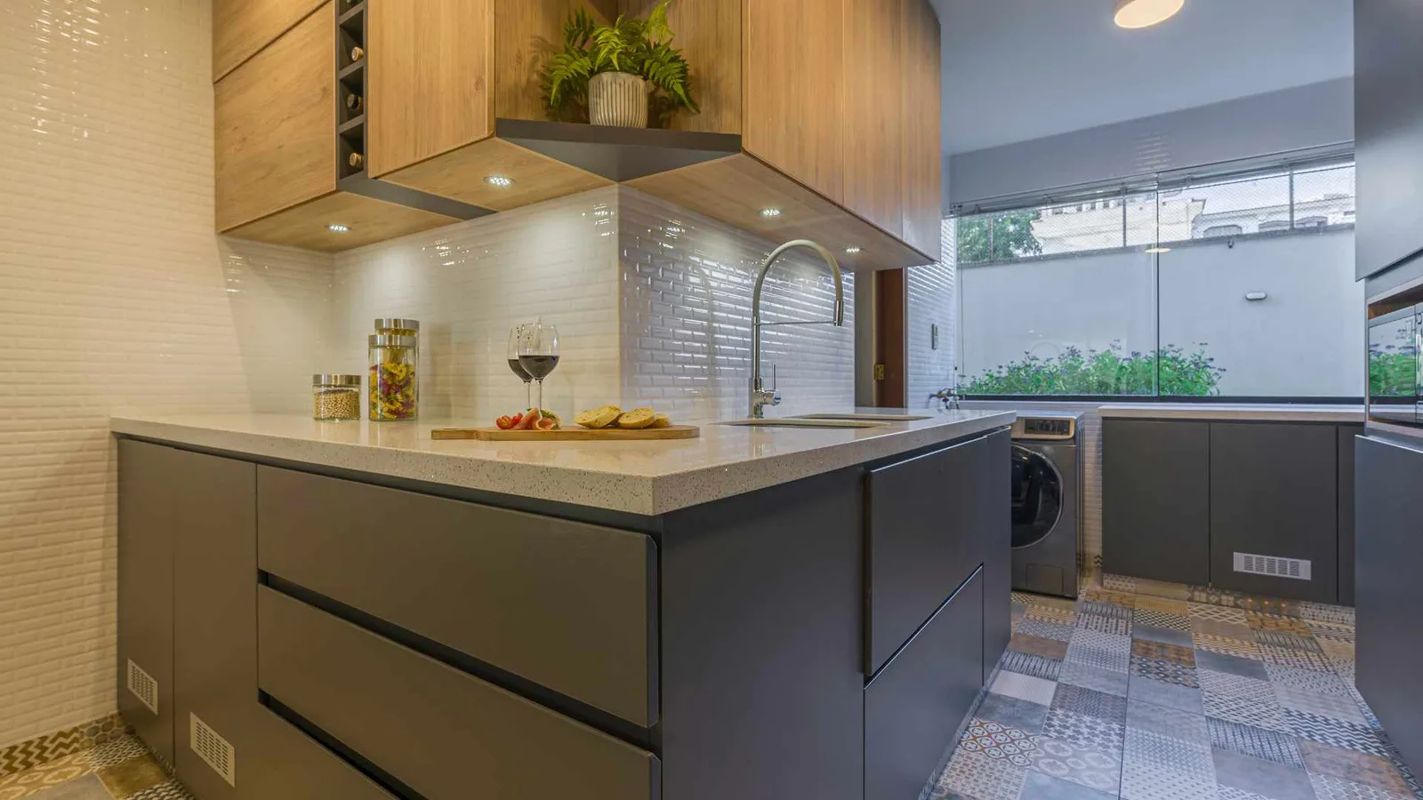 Combined kitchen and laundry area in an ADU