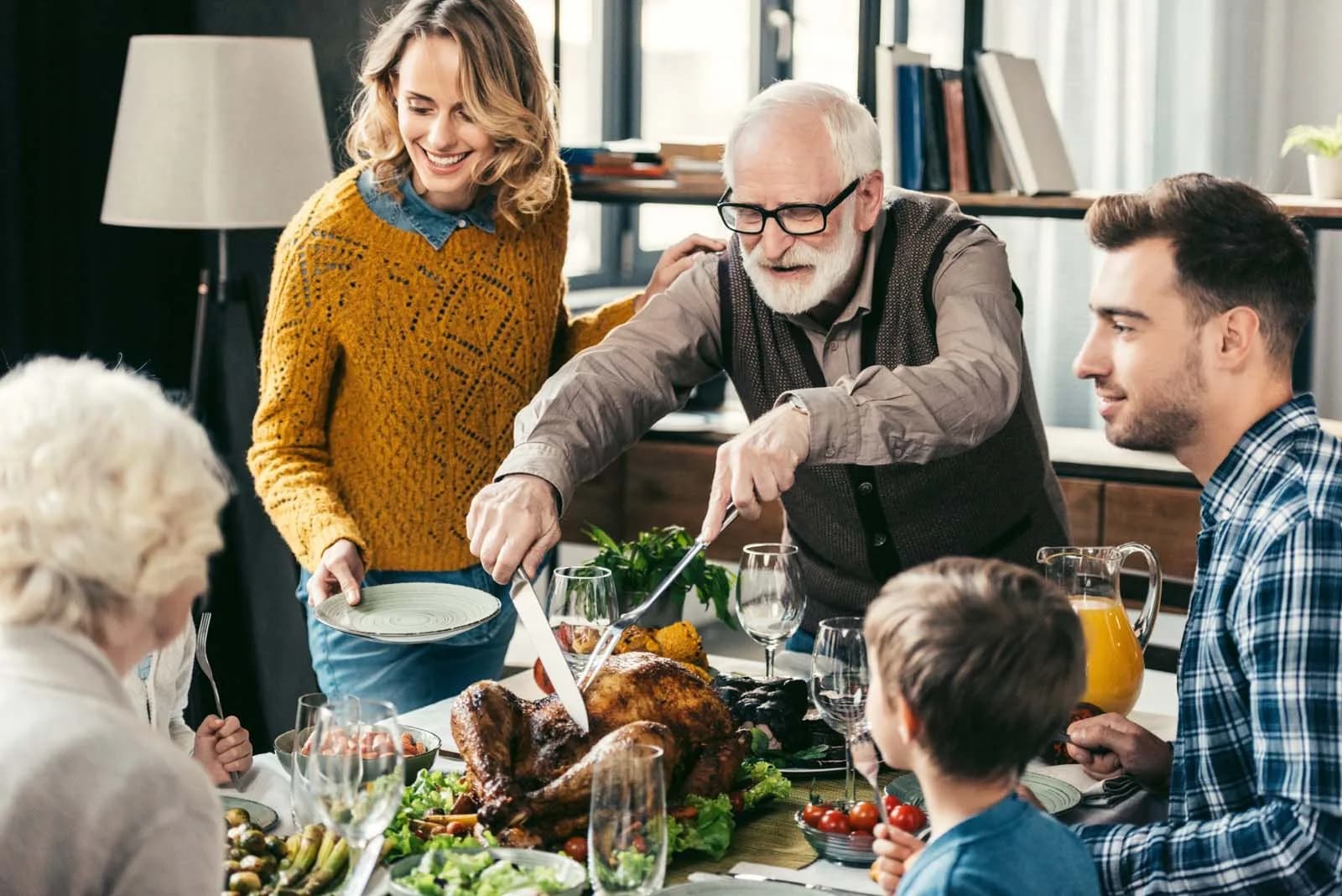 Multi-generational family enjoying backyard ADU retirement living