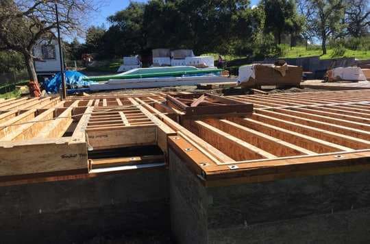 Packaged prefab home kit shipment ready for assembly