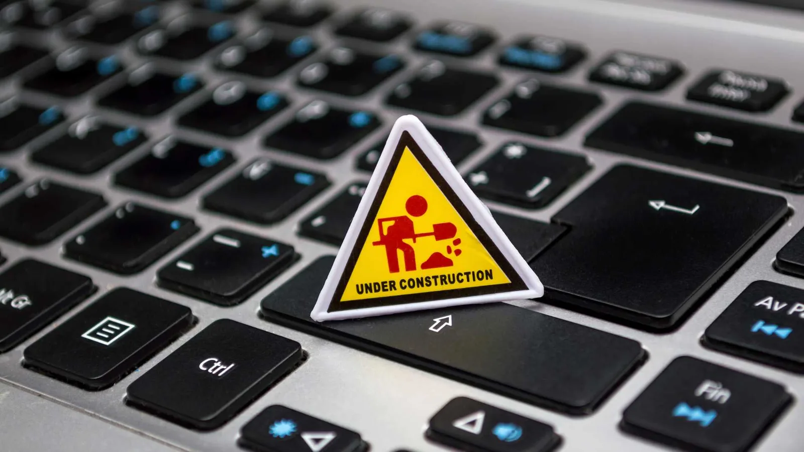 Under construction road sign during code violation abatement work