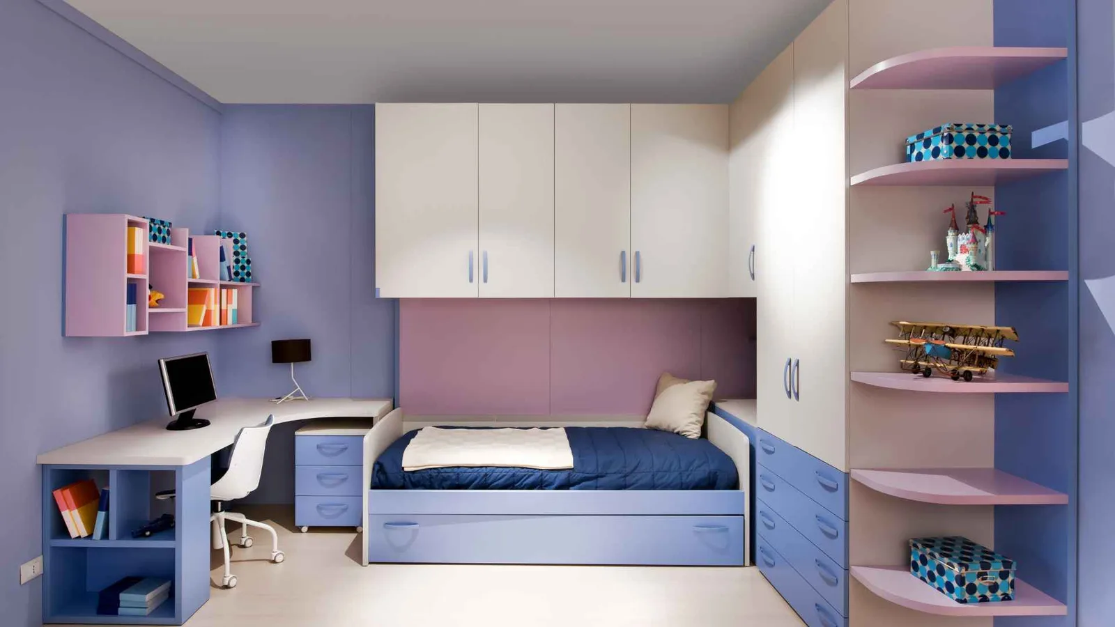 Compact bedroom arranged for kids in a custom tiny home