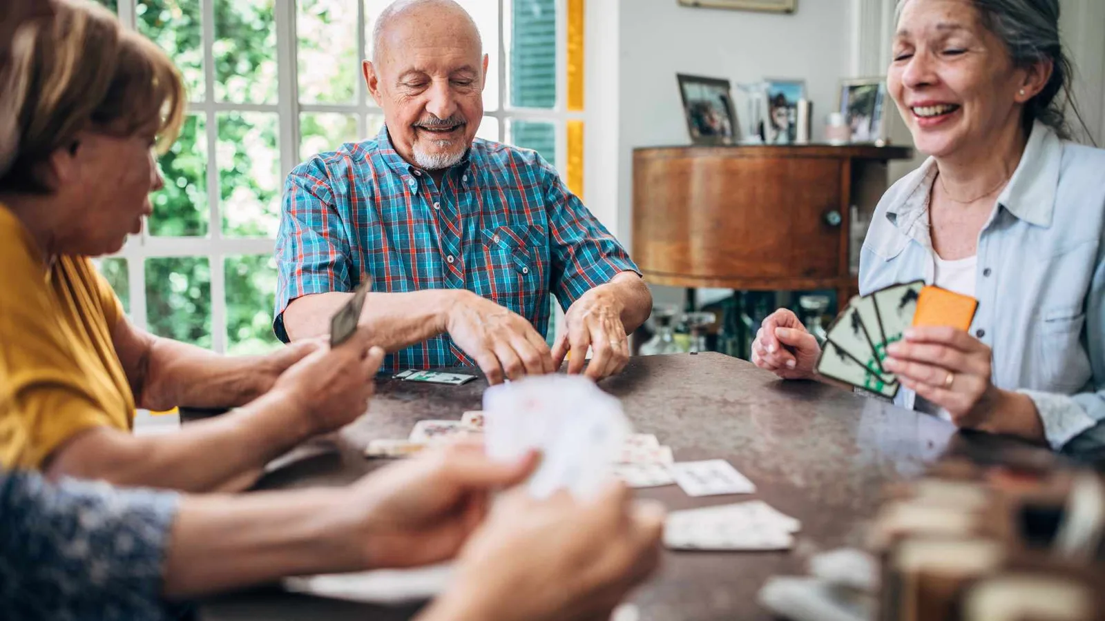 seniors playing cards