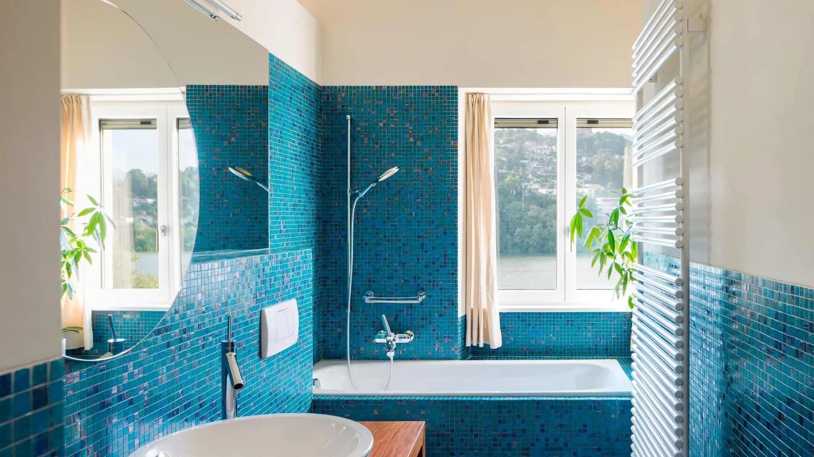 Traditional ADU bathroom finished in soft blue tones