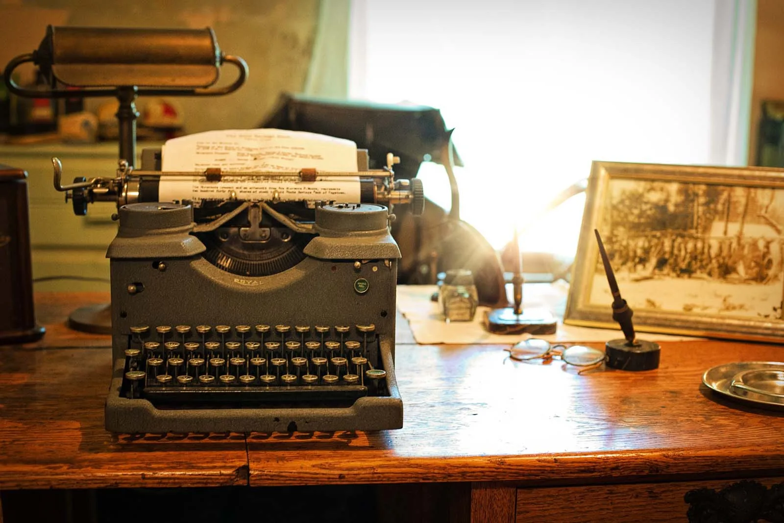 Vintage typewriter on a wooden desk in a writer's retreat