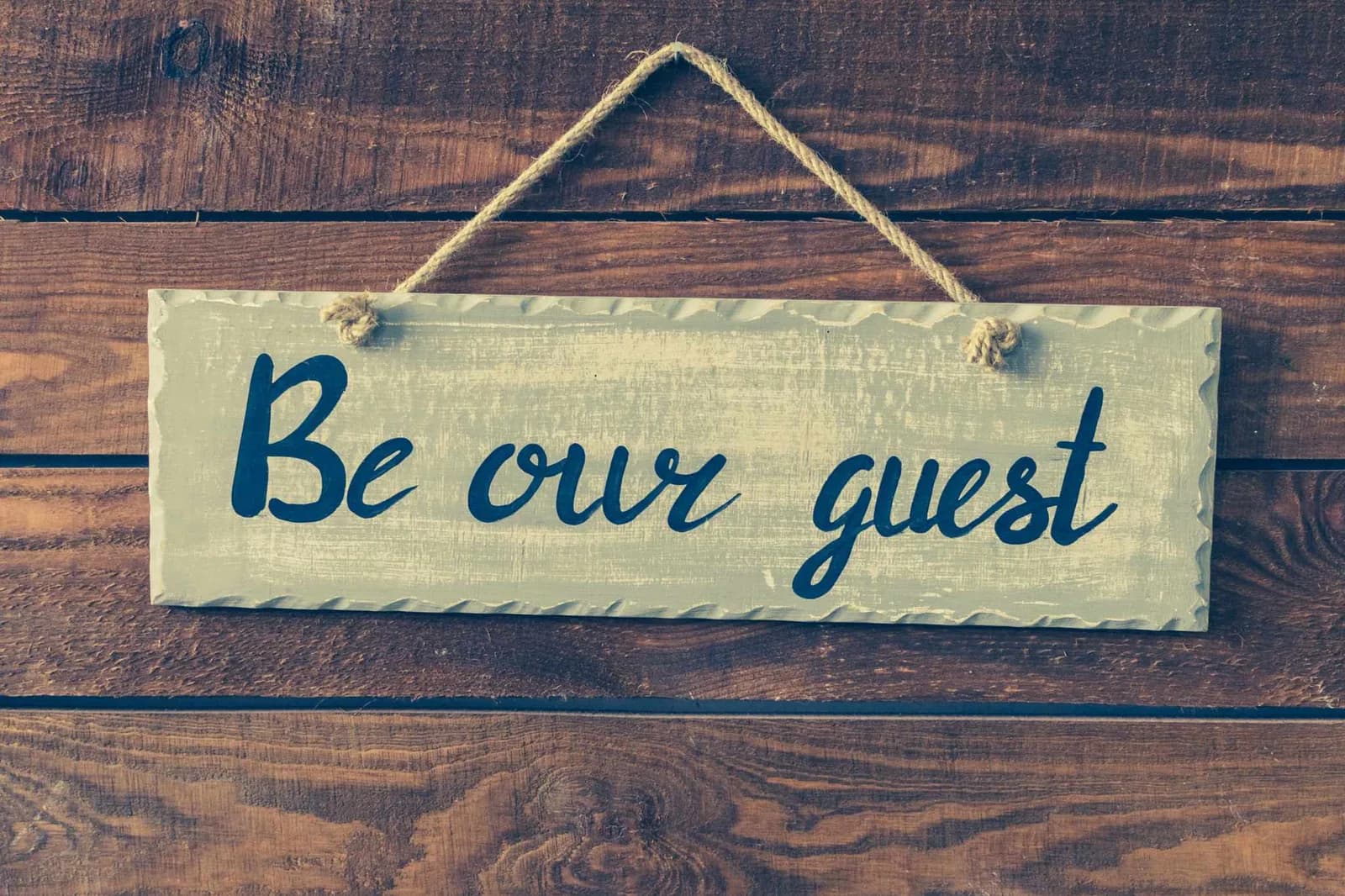 Welcoming sign be our guest