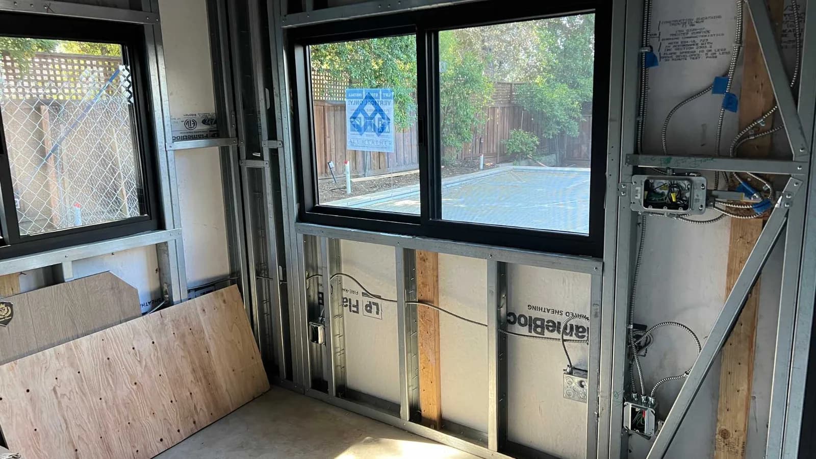windows installed plus fire resistant materials